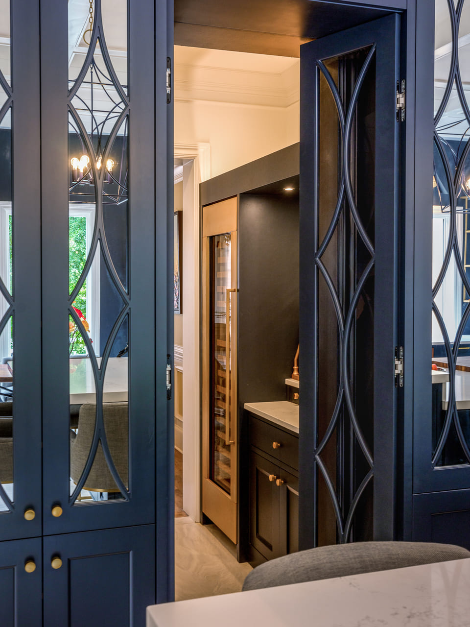 Secret cabinet door entryway into a pantry