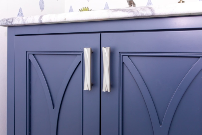 bathroom vanity with designed doors