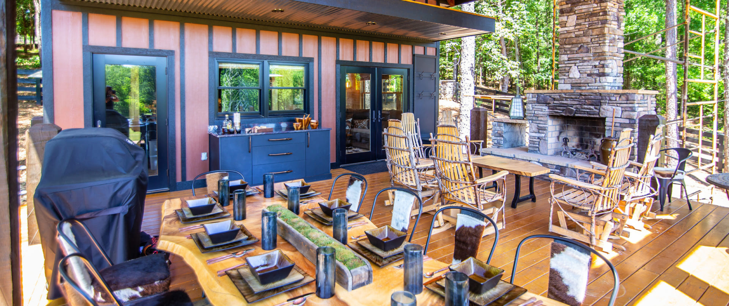 Outdoor dining space with a balcony