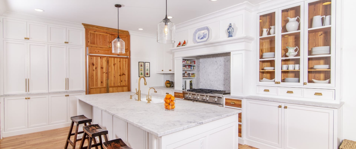 white kitchen with wooden accents