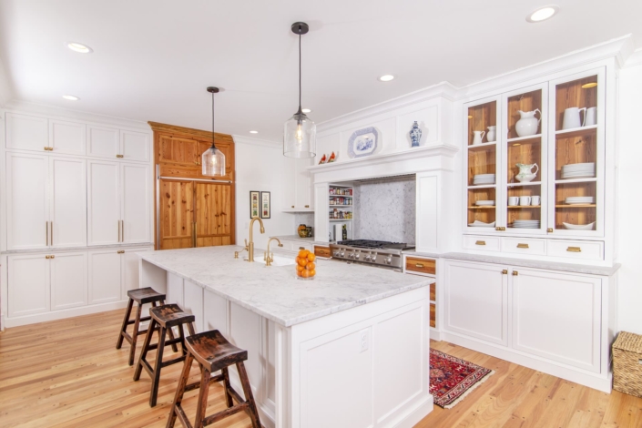 white kitchen with wooden accents