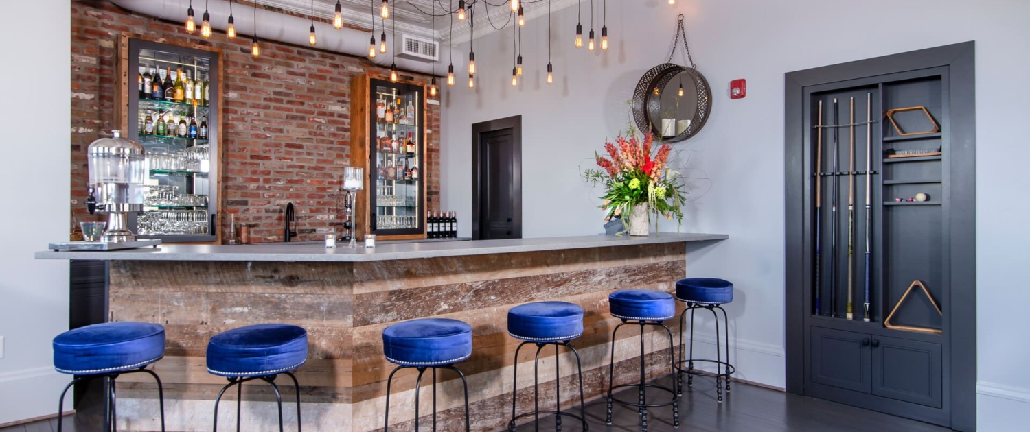 bar with blue stools