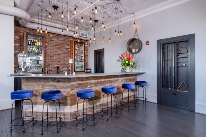 bar with blue stools
