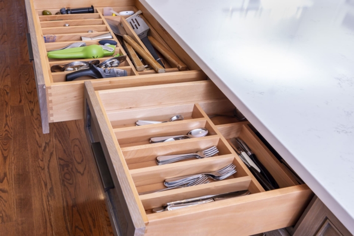 silverware/utensil drawers in a kitchen island