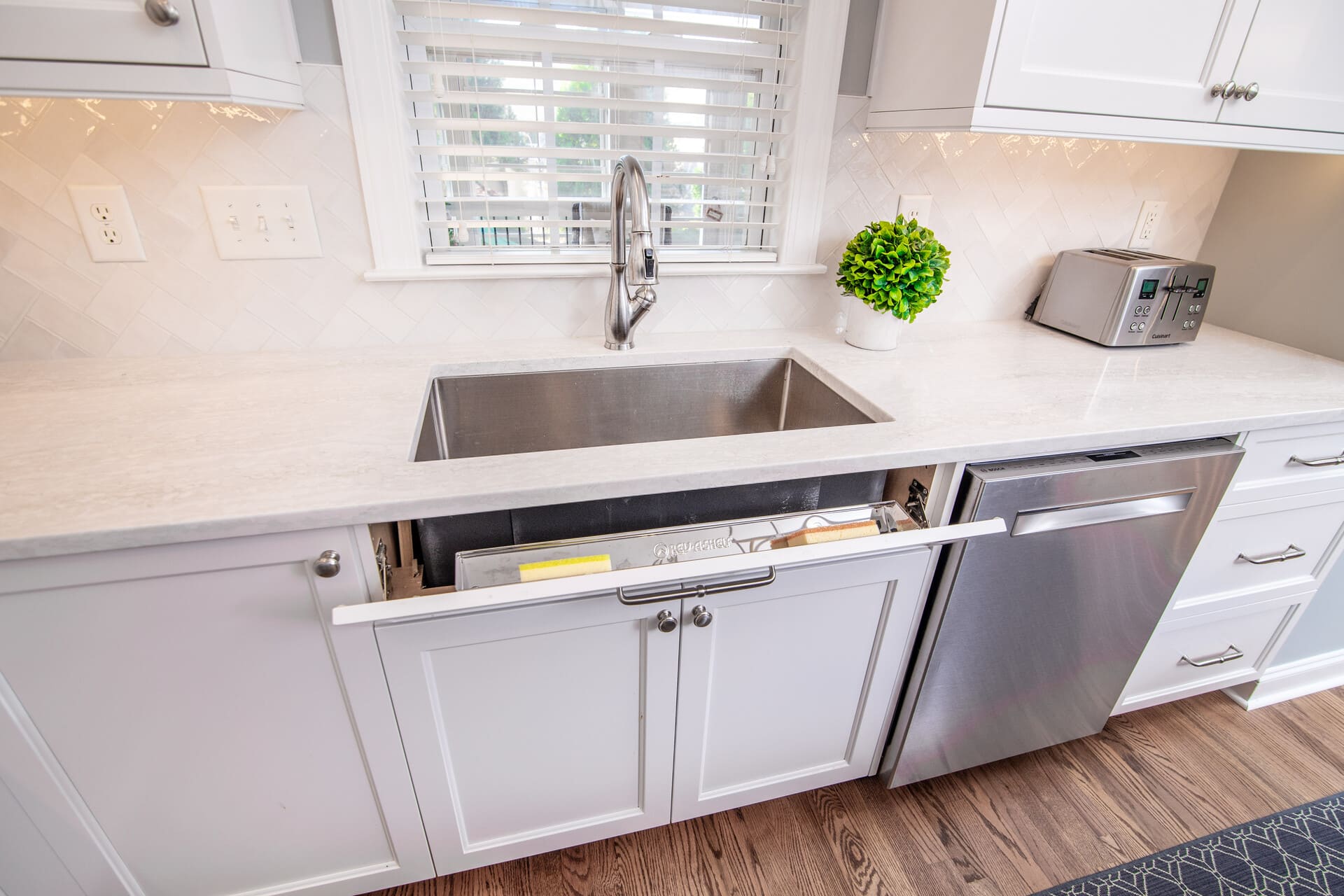 kitchen with a sink and dishwasher