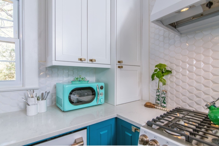 white kitchen with tile backsplash