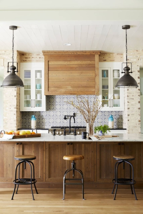 farmhouse kitchen with a brown island