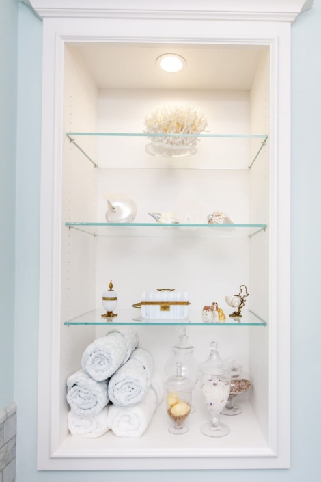 glass shelves in a bathroom