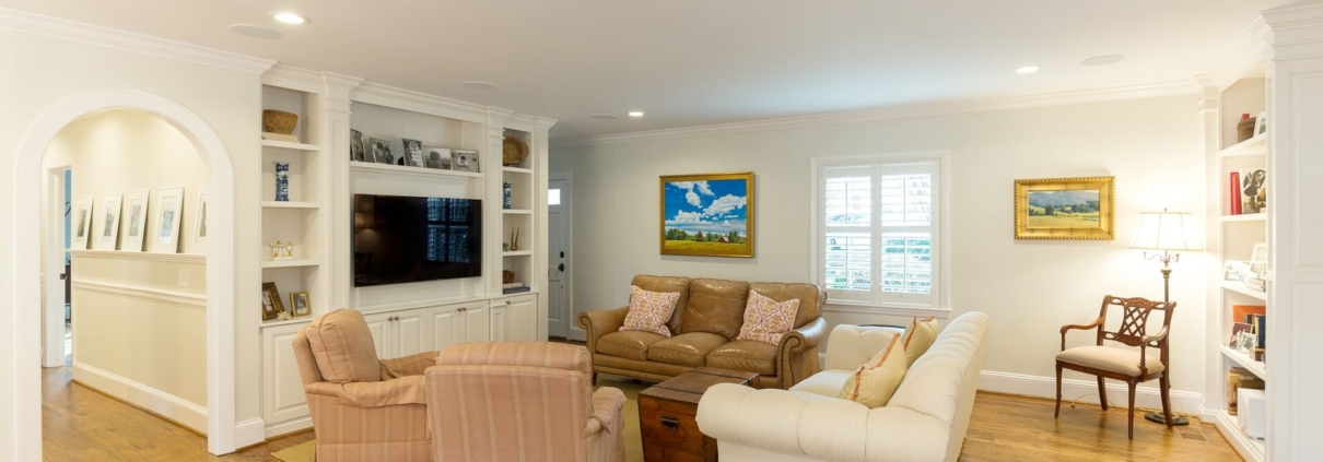 historic living room with an entertainment center
