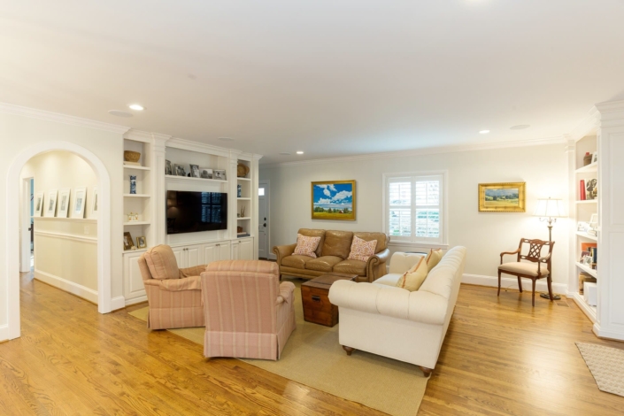 historic living room with an entertainment center