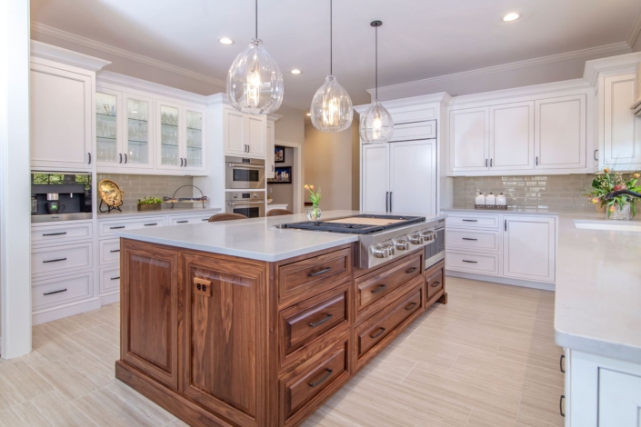 white and brown kitchen with lights