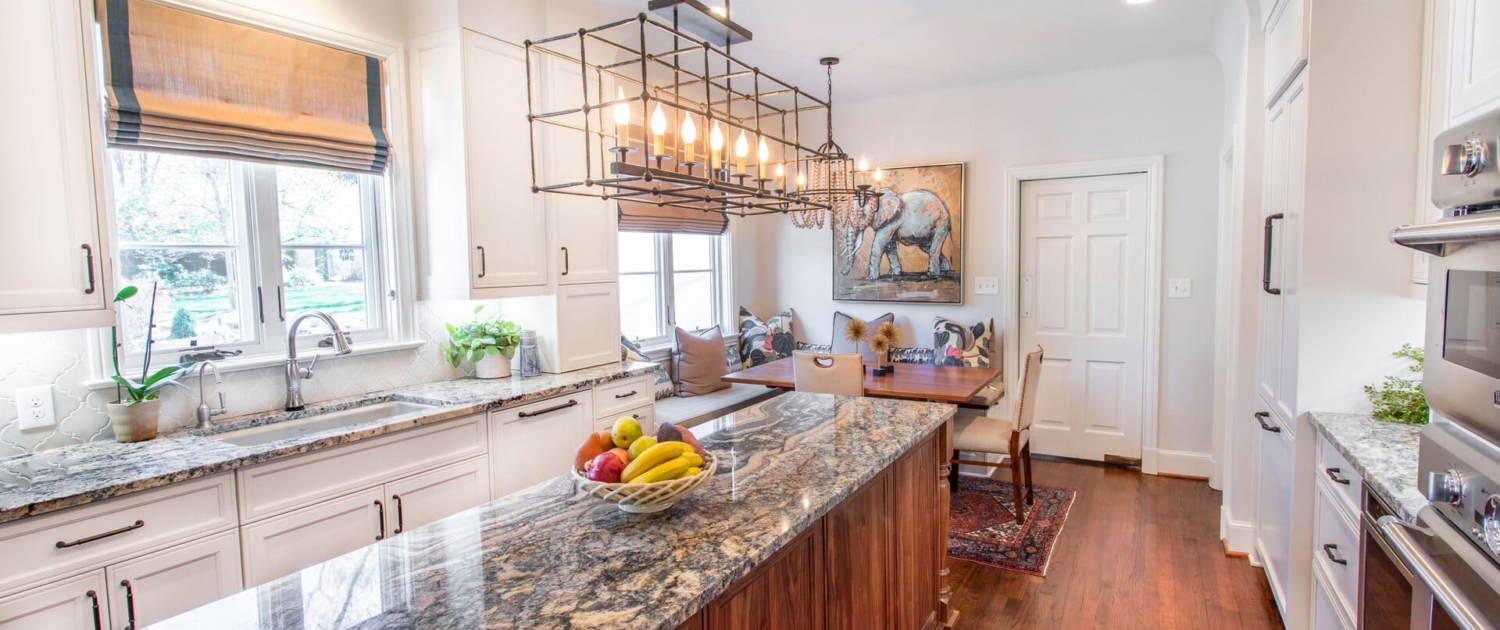 white kitchen with a dining room