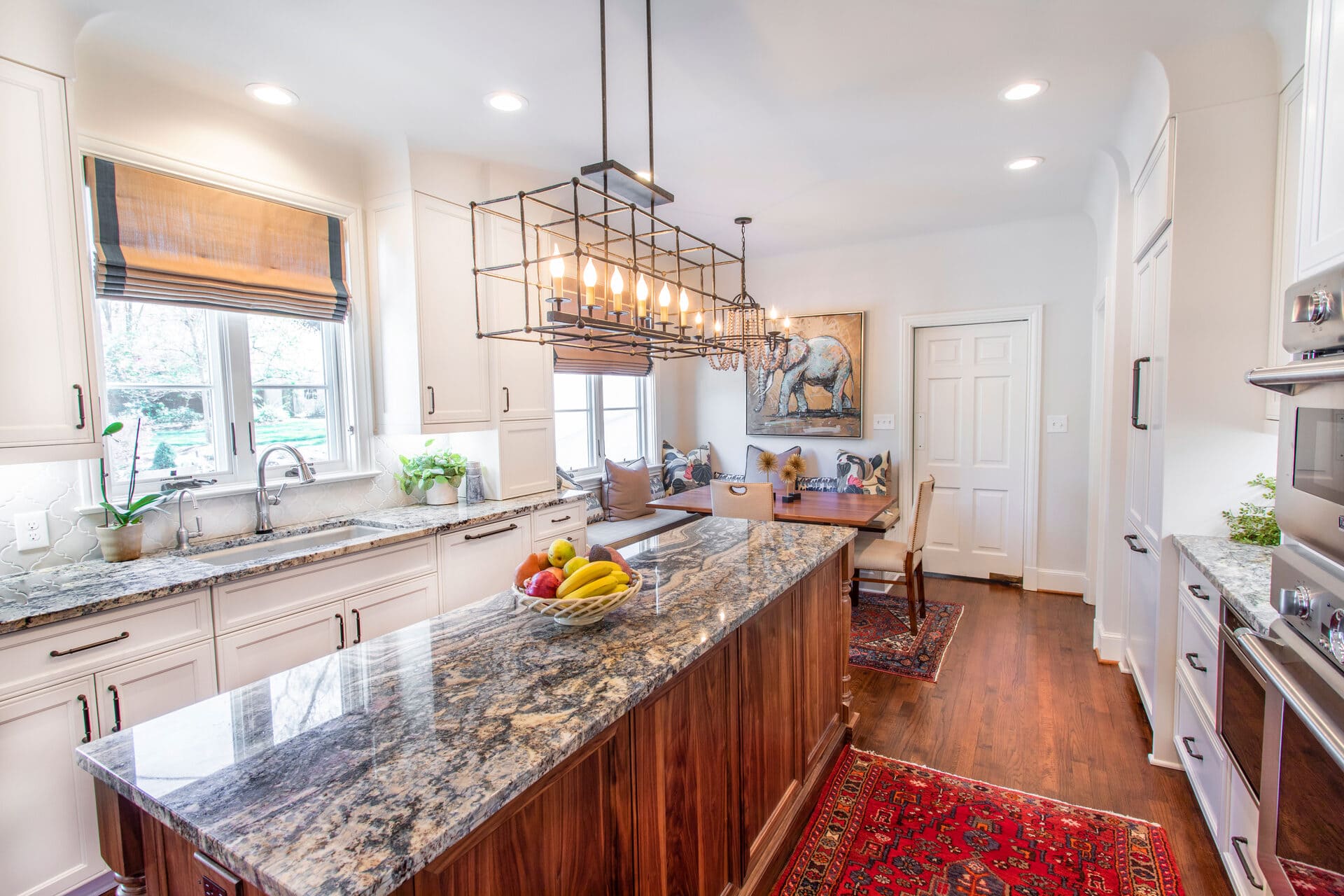 white kitchen with a dining room