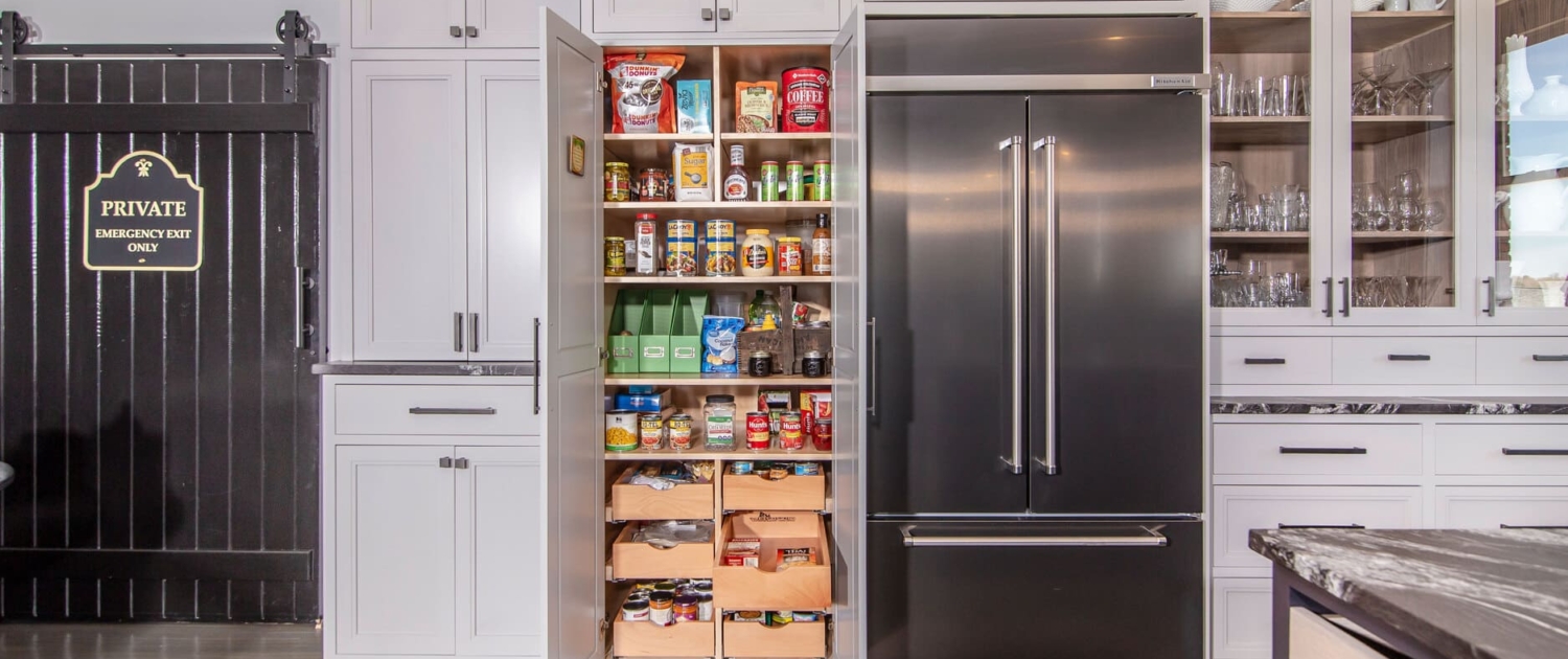 white kitchen with pantry storage