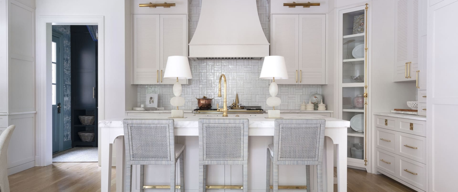 white kitchen with lamps