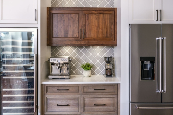 beverage center with a wine fridge and coffee maker