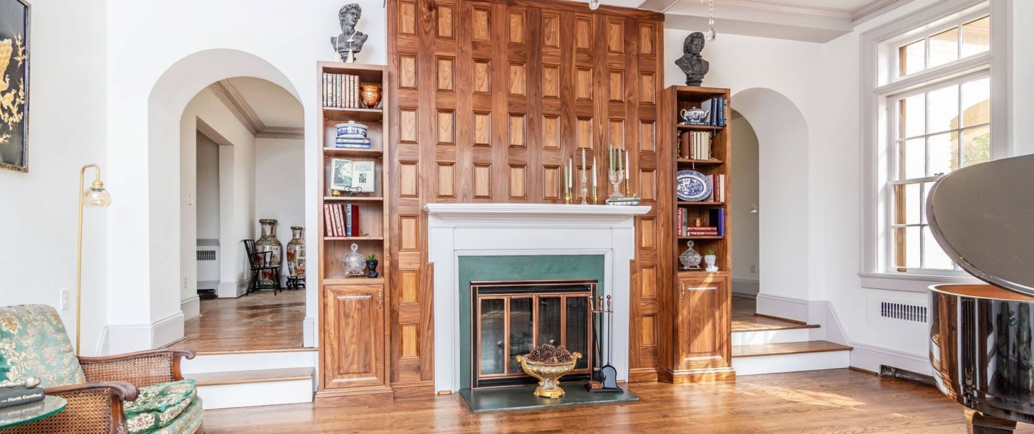 walnut fireplace in a sitting room