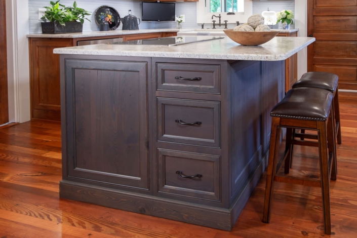 grey island with black hardware