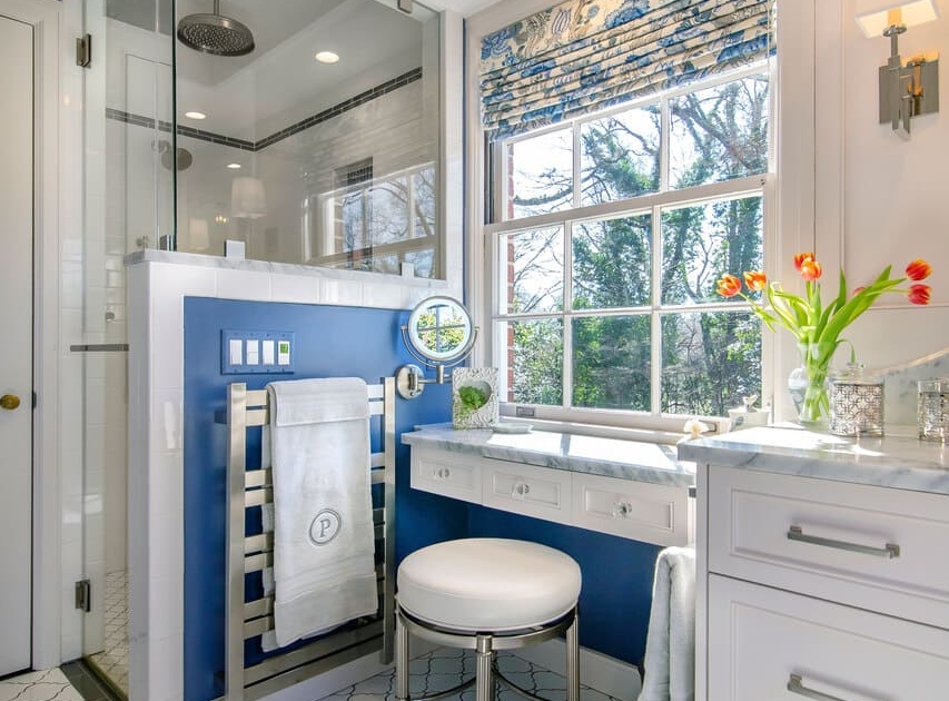 white and blue bathroom with tile flooring