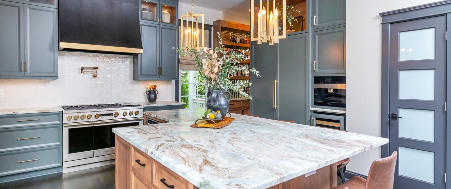 blue and brown kitchen with gold lights