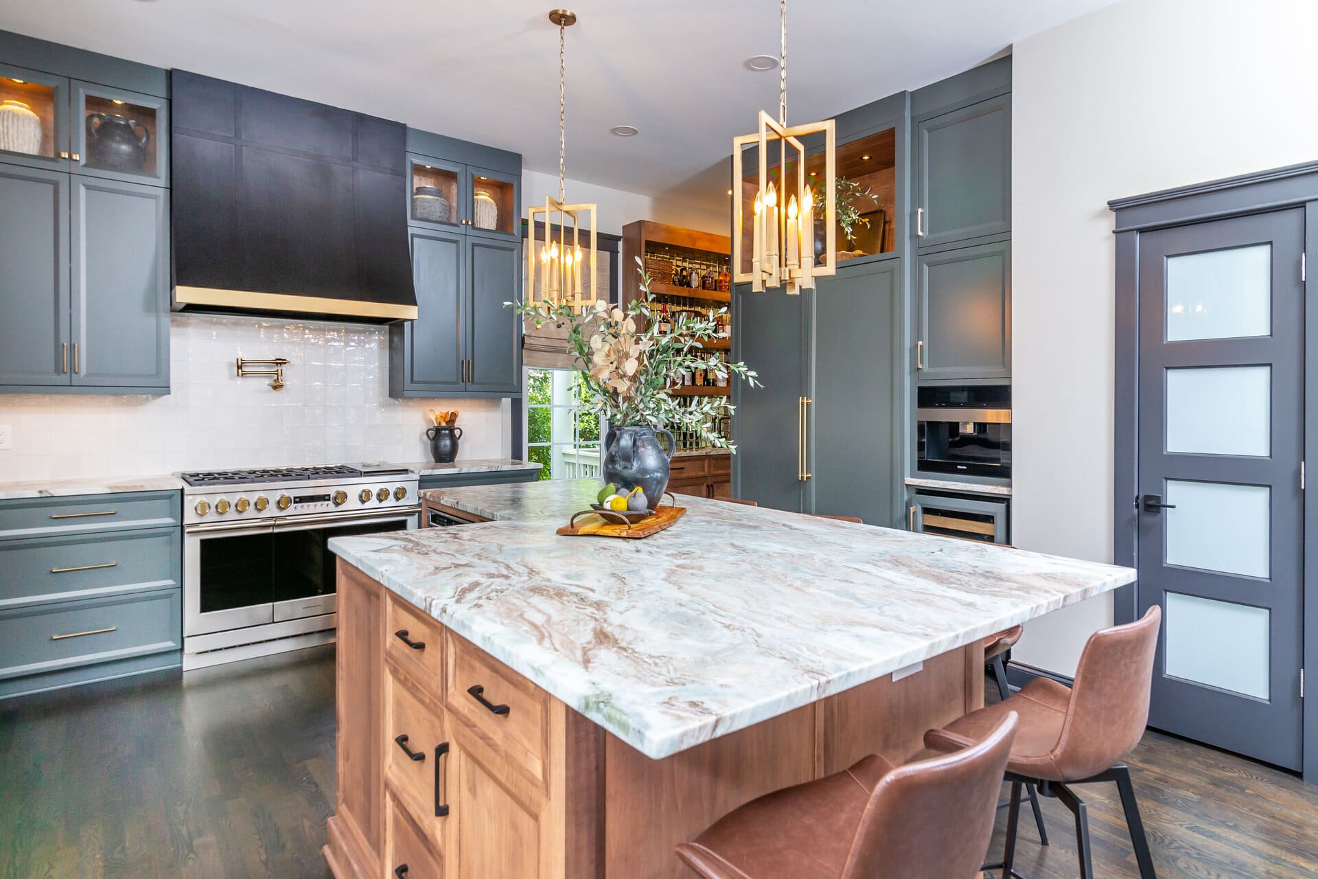 blue and brown kitchen with gold lights