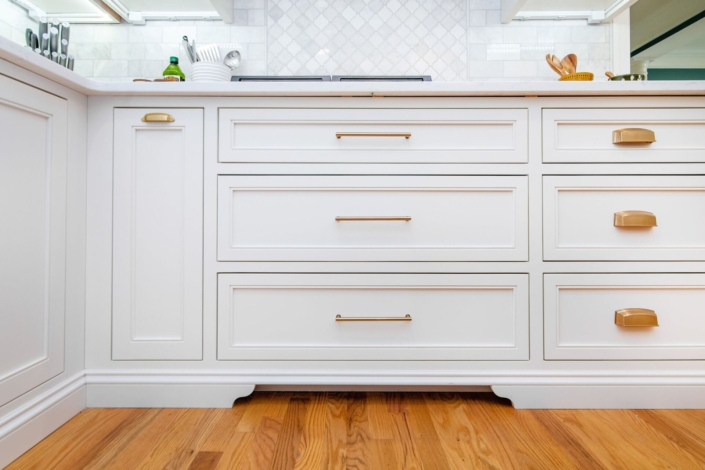 white cabinets with gold hardware