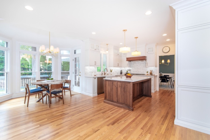 dining area and kitchen with big windows