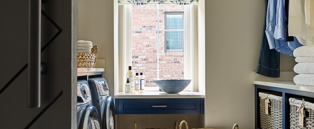 mudroom and laundry room with tile flooring