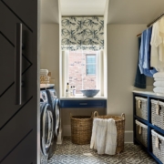 mudroom and laundry room with tile flooring