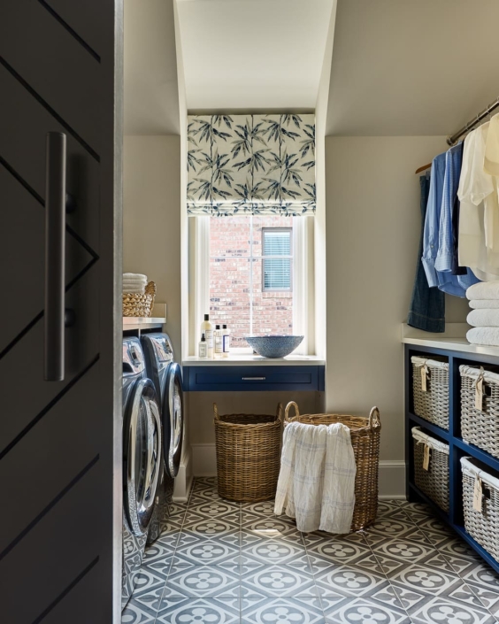 mudroom and laundry room with tile flooring