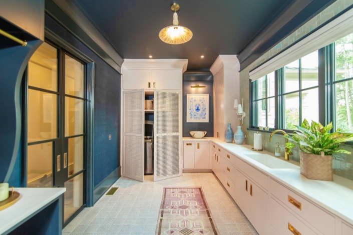 laundry room with big windows