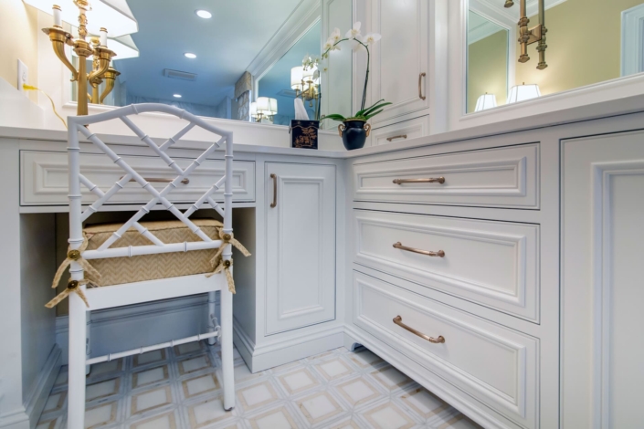 bathroom vanity with a chair