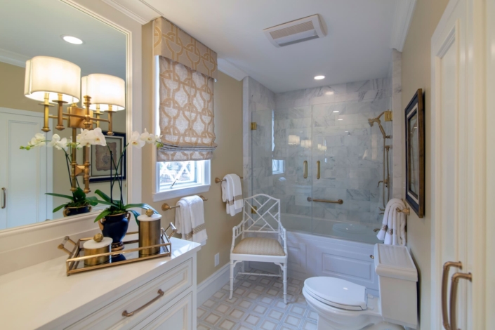 bathroom with a chair and shower