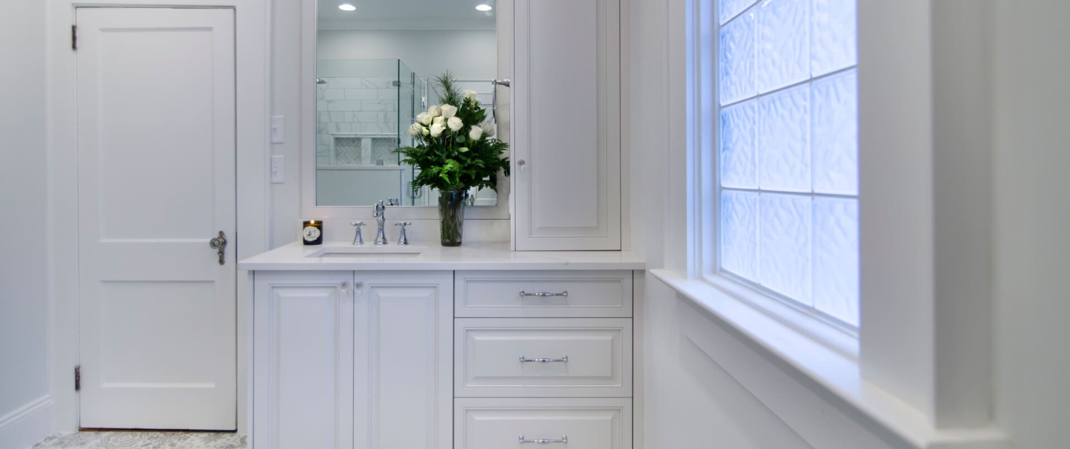 white bathroom with a large window