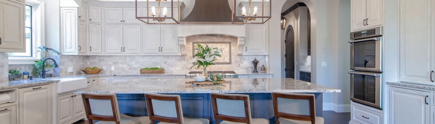 kitchen with lights and stools