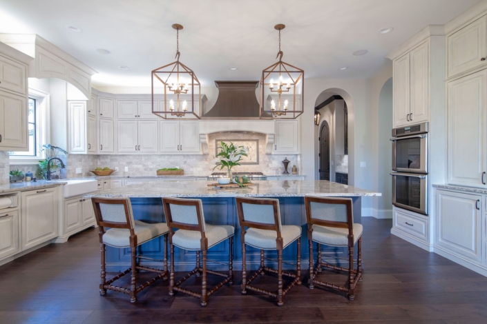 kitchen with lights and stools