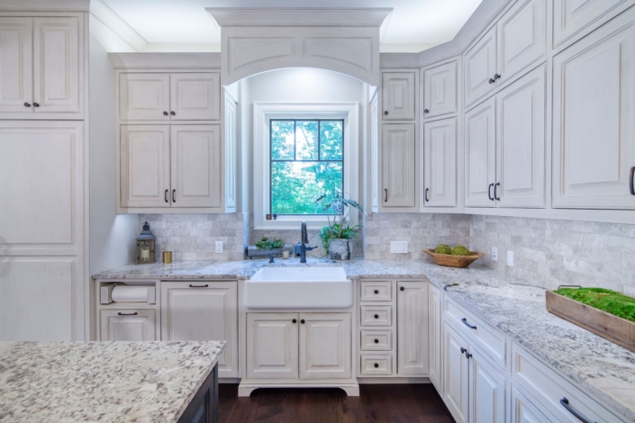 kitchen with a window and farmhouse sink