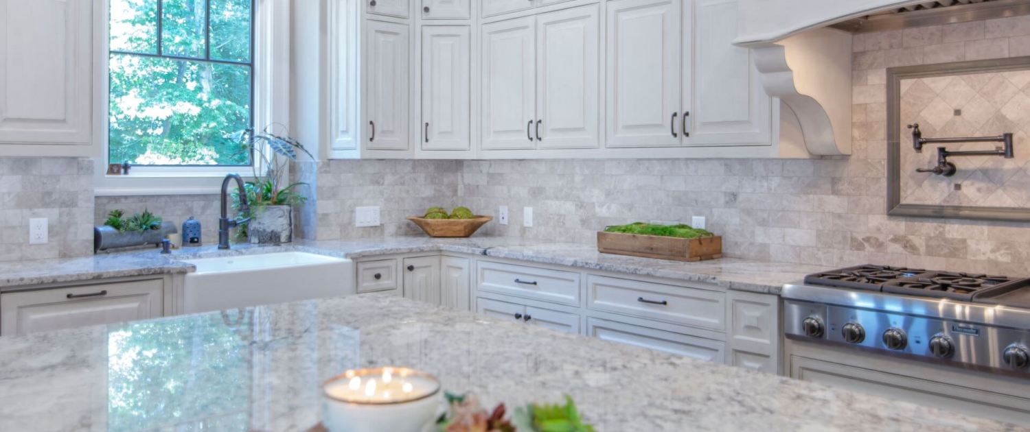 white kitchen with tile backsplash