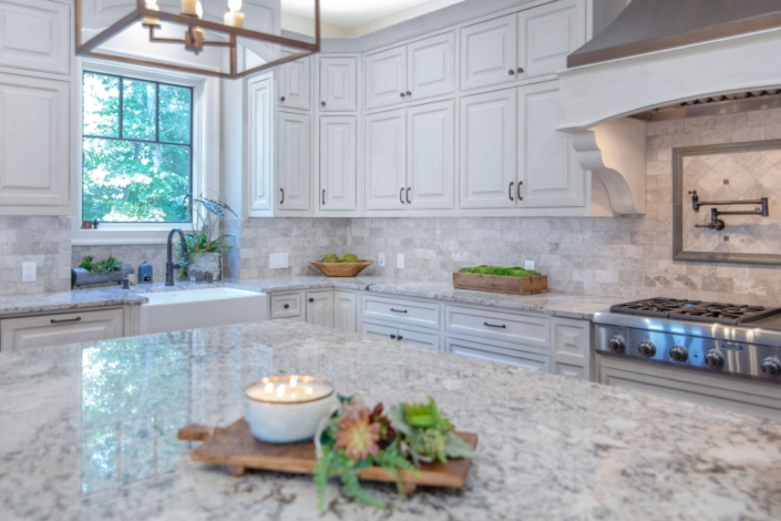 white kitchen with tile backsplash