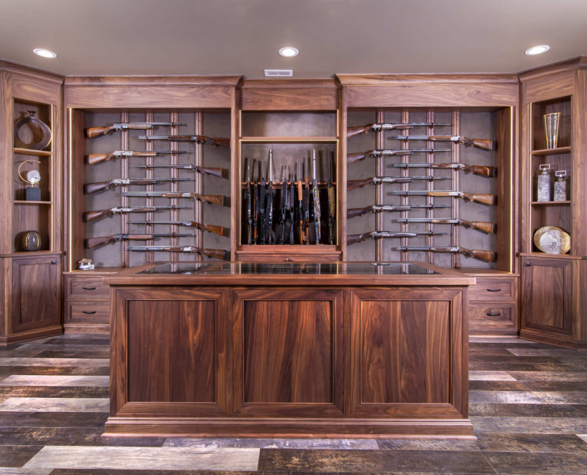 Custom gun room cabinets with hanging storage