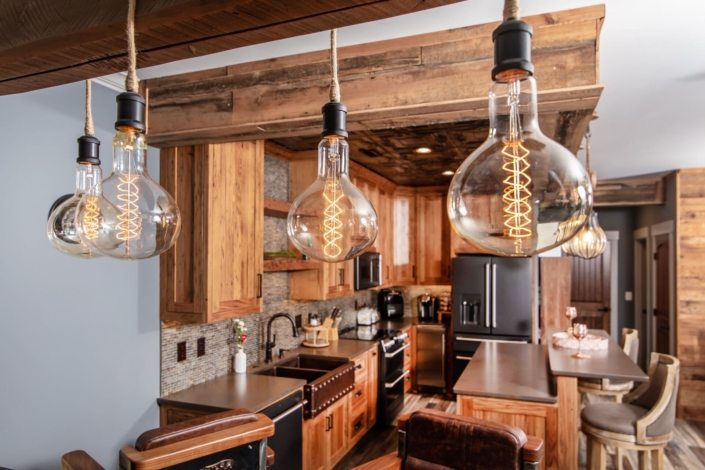 lights and a brown pool house kitchen