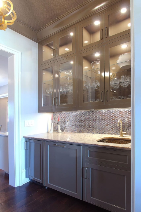 wet bar with glass doors