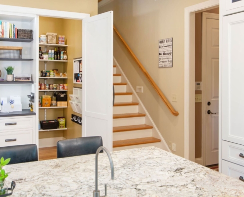 hidden pantry by a staircase