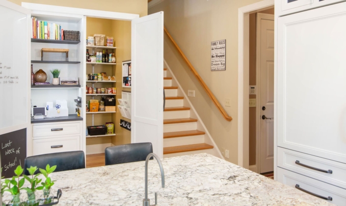 hidden pantry by a staircase