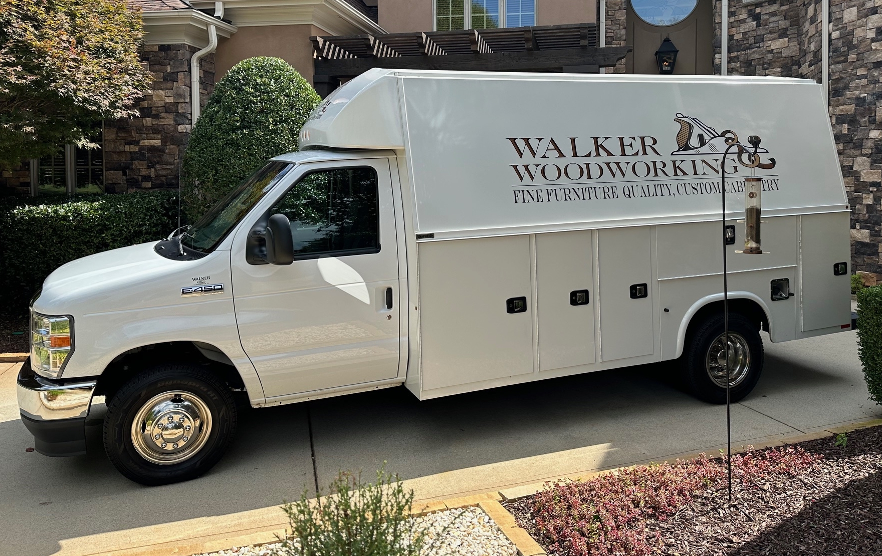 walker woodworking install truck in front of home